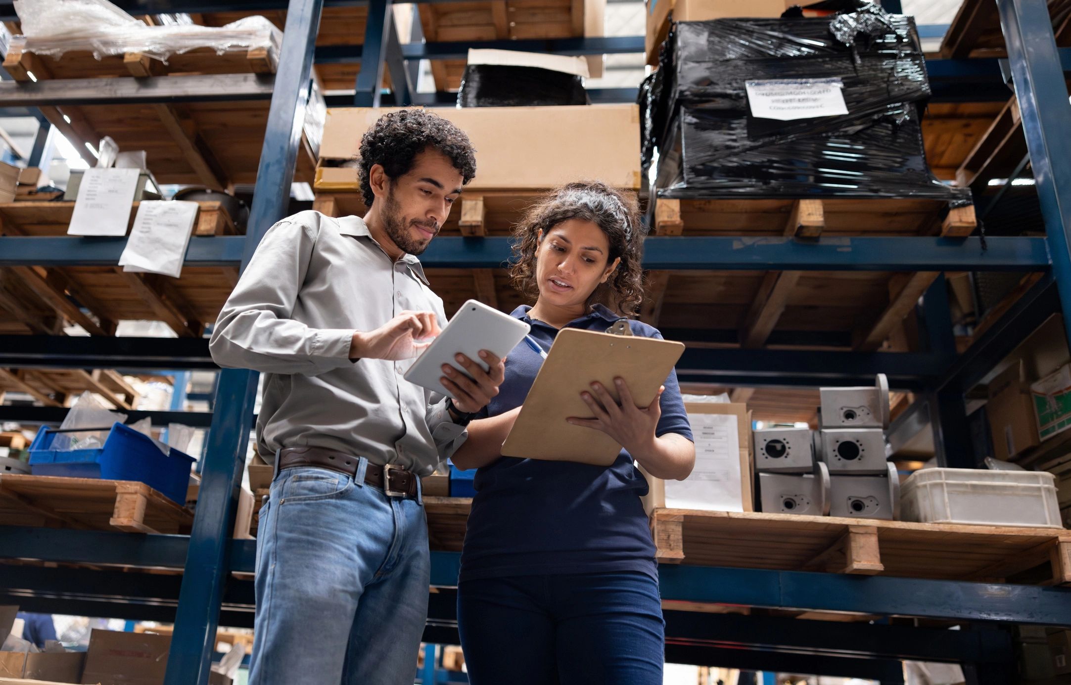 Warehouse team collaborating on inventory